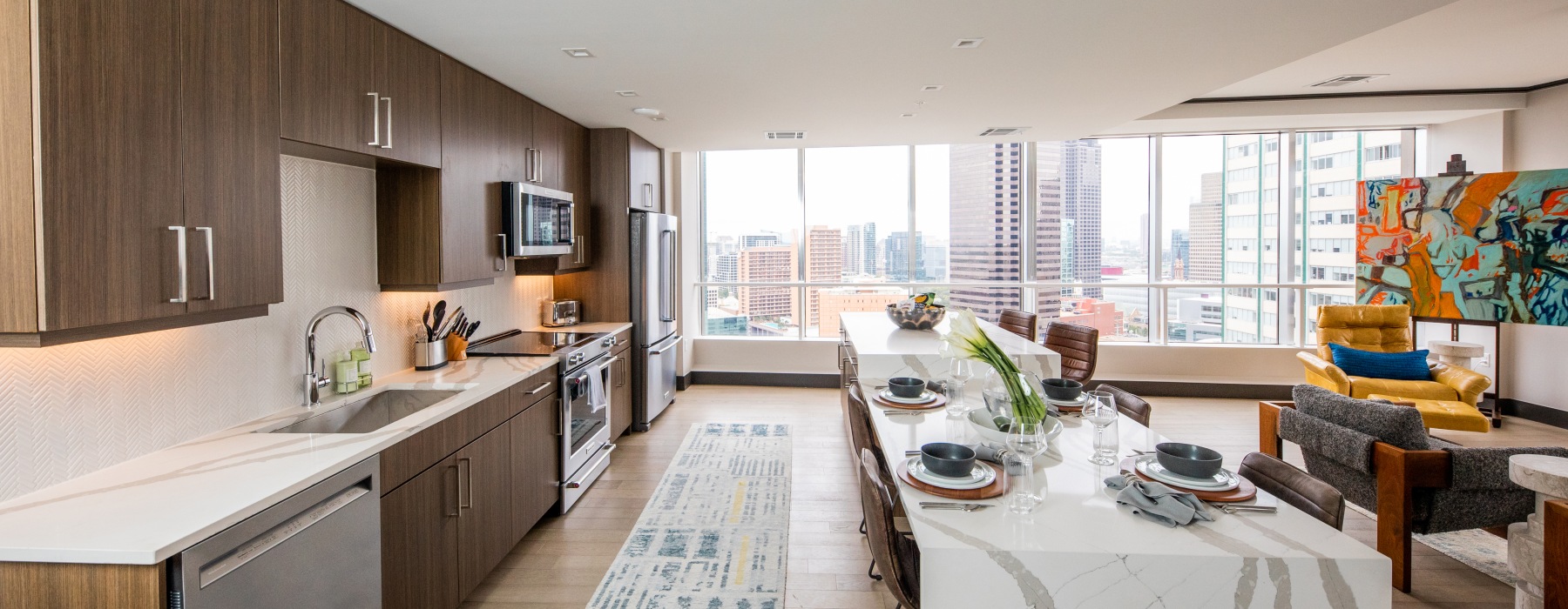 long island, brown cabinets, floor to ceiling windows