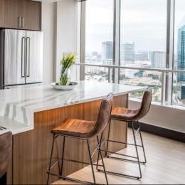 Dinner with a view - right at home. Expansive cityscapes and elevated living come standard at The National.