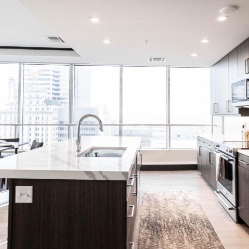 Spacious kitchens with thoughtful details kitchen with large windows and island