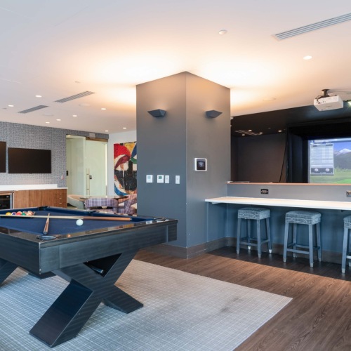 Enjoy our resident-only features pool table, chairs with table and golf on tv