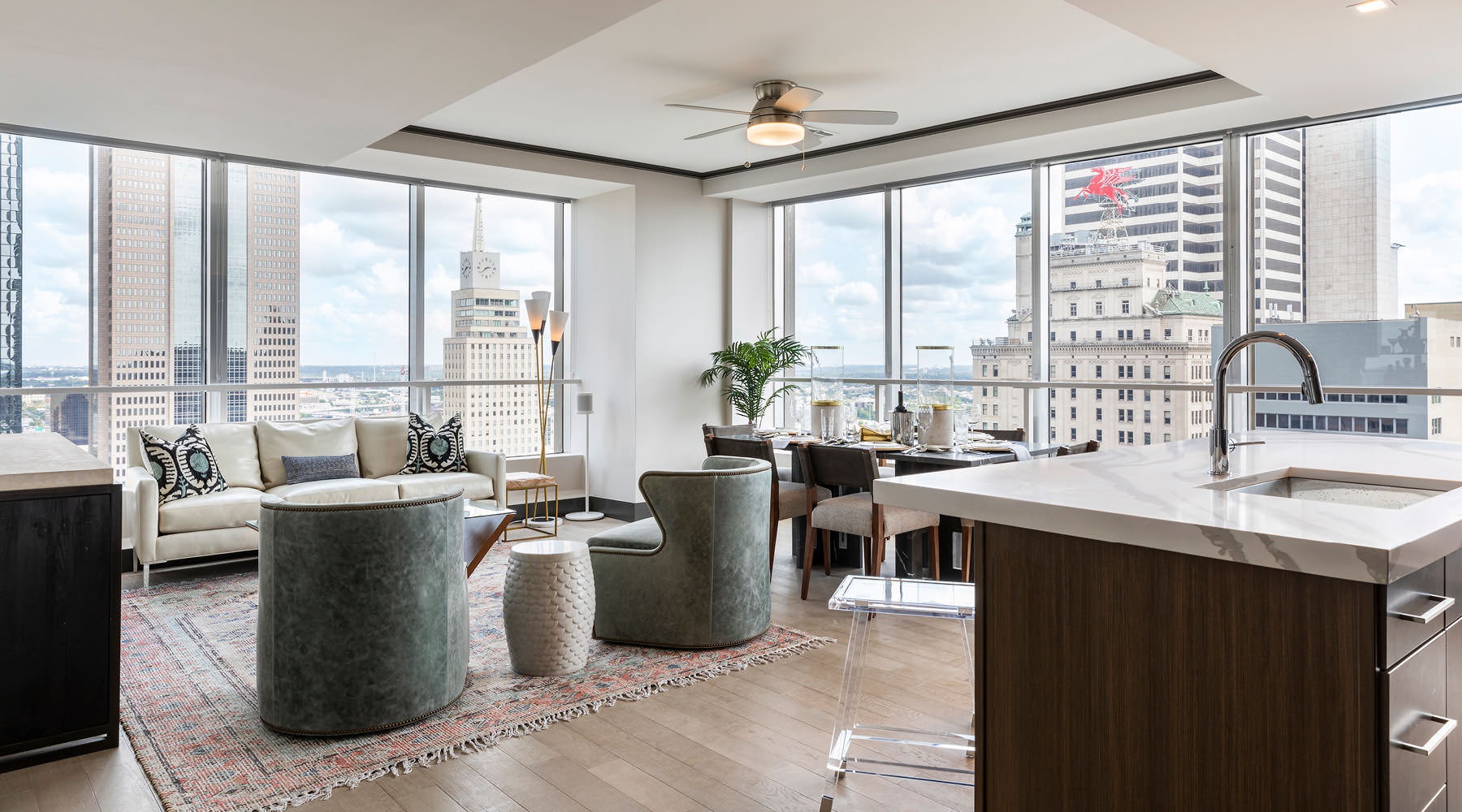 Wide open living areas flooded with natural light spacious living room open to kitchen with fantastic city views